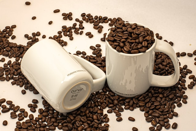 Two enamel coffee mugs