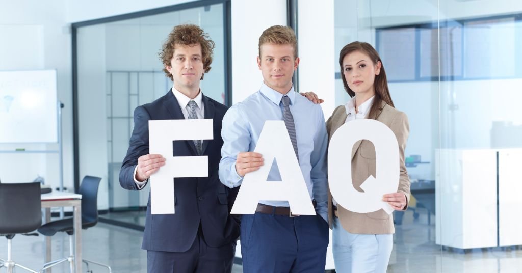 A image of FAQ with three clients in the office